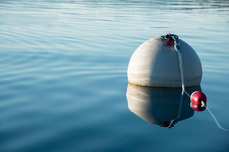 Calm waters for tied buoy